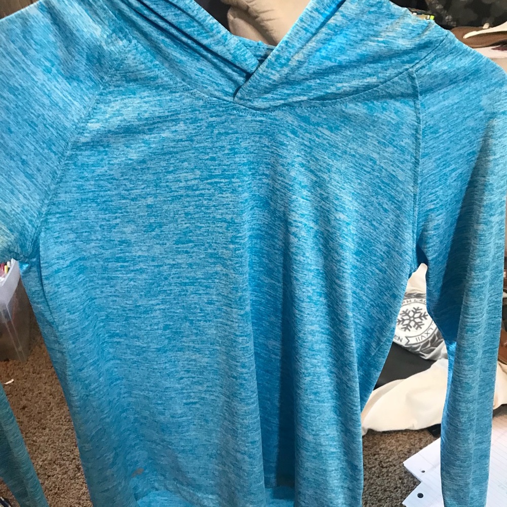 A shirt with a hoodie